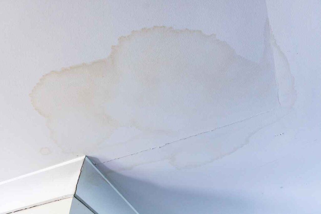 Water damaged ceiling in residential house due to a plumbing leak