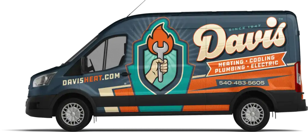 A dark blue van with “Davis Heating • Cooling • Plumbing • Electric” branding, a hand holding a wrench logo, and contact info including a website and phone number on the side.
